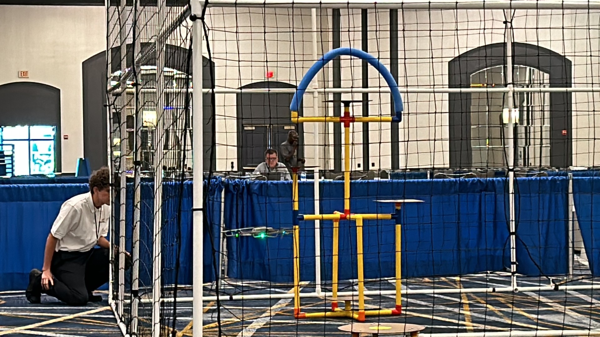A yellow and blue pipe structureDescription automatically generated